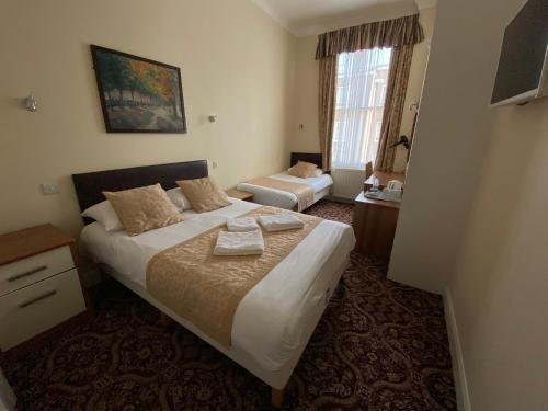 Habitación Triple del hotel Belvedere. Foto 6