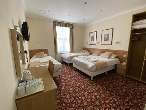 Habitación cuádruple del hotel Belvedere. Foto 3