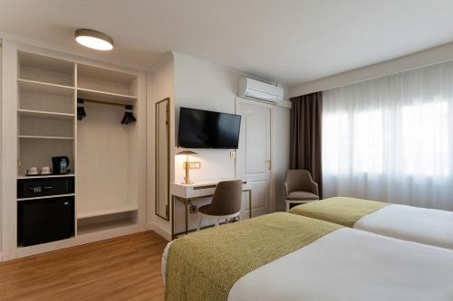 Habitación Doble Económica - 2 camas del hotel Araxa - Adults Only. Foto 5