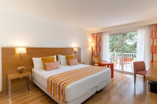 Habitación Doble Superior con vistas al jardín - 1 o 2 camas del hotel Hesperia Ciudad De Mallorca. Foto 1
