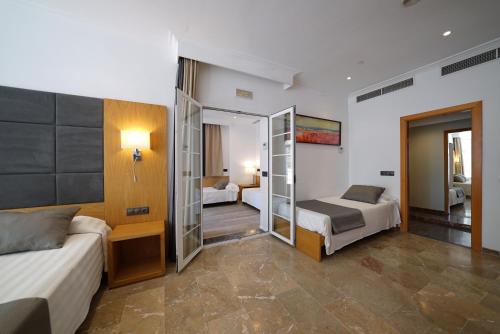 Habitación Familiar Séxtuple del hotel Artmadams. Foto 7