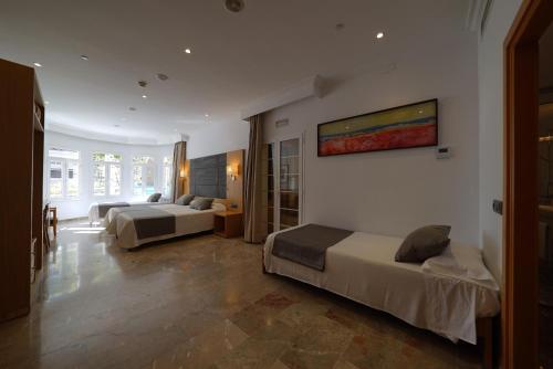 Habitación Familiar Séxtuple del hotel Artmadams. Foto 9