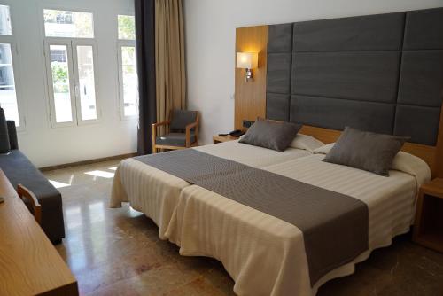 Habitación Triple del hotel Artmadams. Foto 4