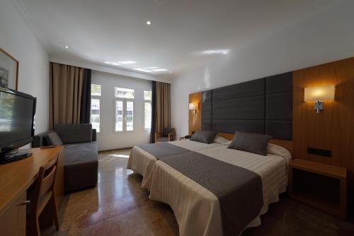 Habitación Triple del hotel Artmadams. Foto 8