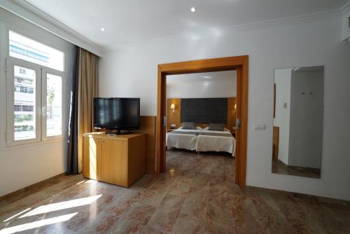 Habitación Cuádruple del hotel Artmadams. Foto 1