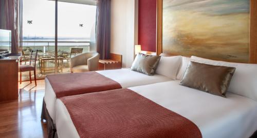 Habitación Doble con vistas al mar - 1 o 2 camas del hotel Catalonia Majorica. Foto 7