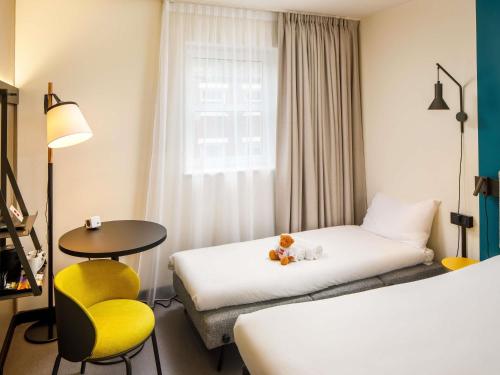 Habitación Familiar - 1 cama doble y 1 cama individual del hotel Ibis London Greenwich. Foto 1