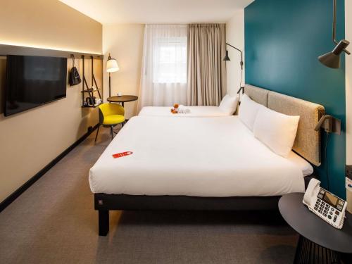 Habitación Familiar - 1 cama doble y 1 cama individual del hotel Ibis London Greenwich. Foto 1
