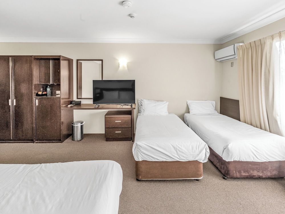 Habitación Familiar Mediana del hotel Ibis Styles Canberra Tall Trees. Foto 1