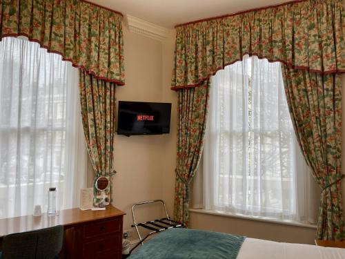 Habitación Doble Estándar - 2 camas del hotel The Windermere , London. Foto 3