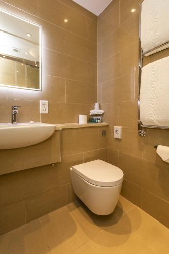 Habitación Doble Deluxe del hotel The Windermere , London. Foto 1