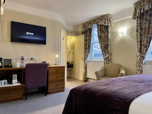 Habitación Doble Deluxe del hotel The Windermere , London. Foto 6
