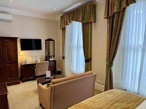 Habitación Doble Deluxe del hotel The Windermere , London. Foto 14