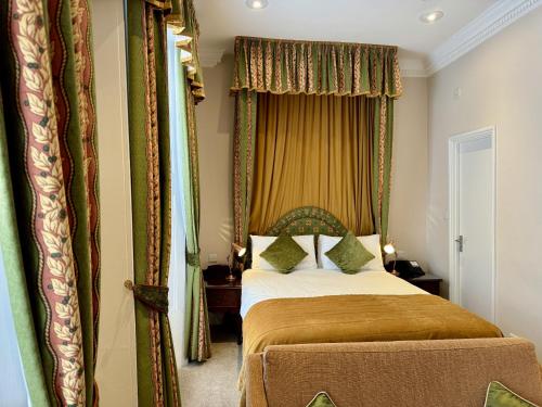Habitación Doble Deluxe del hotel The Windermere , London. Foto 17