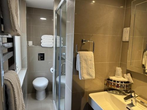 Habitación Triple con ducha del hotel The Windermere , London. Foto 5