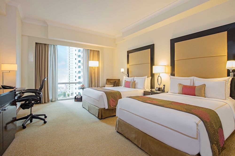 Habitación Fairmont Gold con 2 camas dobles del hotel Fairmont Makati