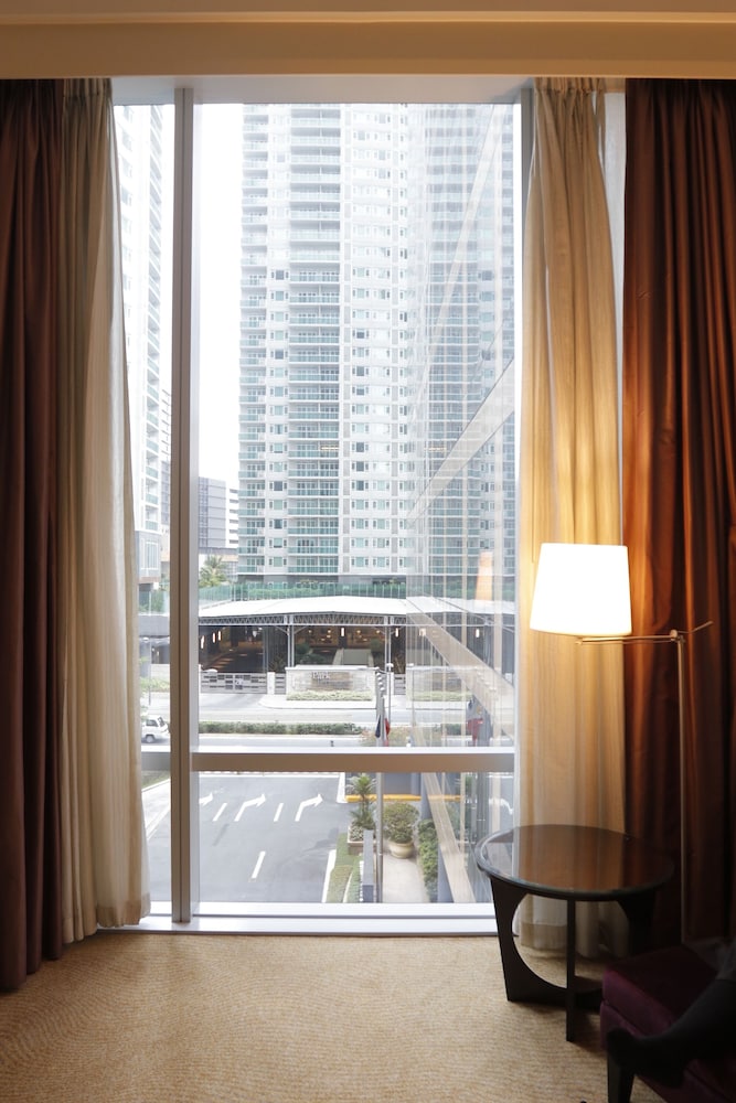 Habitación Fairmont con 2 camas dobles del hotel Fairmont Makati. Foto 4