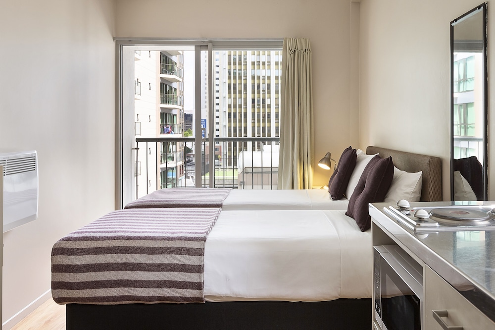 Estudio 2 Camas Individuales del hotel Ibis Budget Auckland Central. Foto 1
