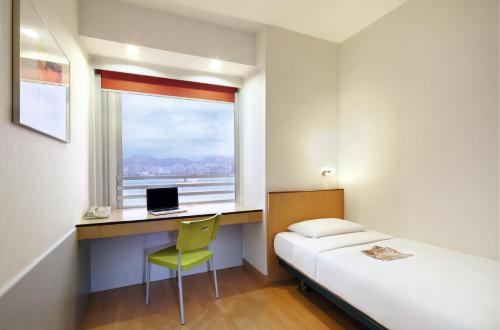 Habitación Individual Estándar del hotel Ibis Hong Kong North Point. Foto 2