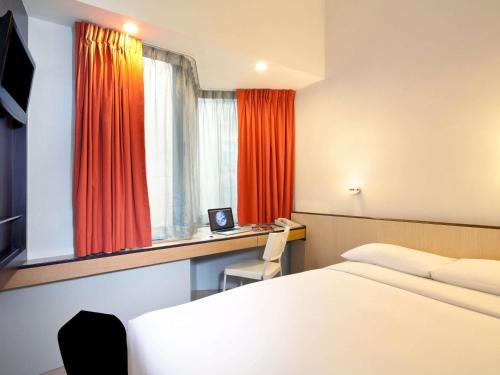 Habitación Doble Estándar del hotel Ibis Hong Kong North Point. Foto 1