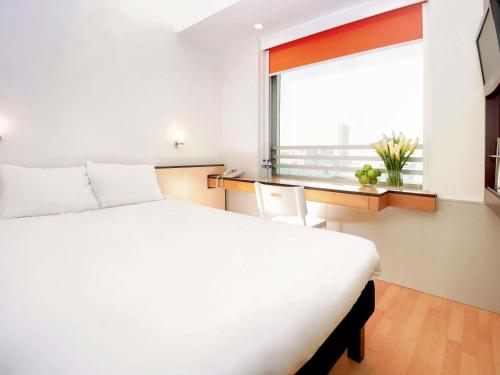 Habitación Doble Superior con vistas al puerto del hotel Ibis Hong Kong North Point