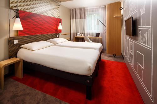 Habitación Doble Sweet by Ibis - 2 camas del hotel Ibis London Stratford. Foto 5