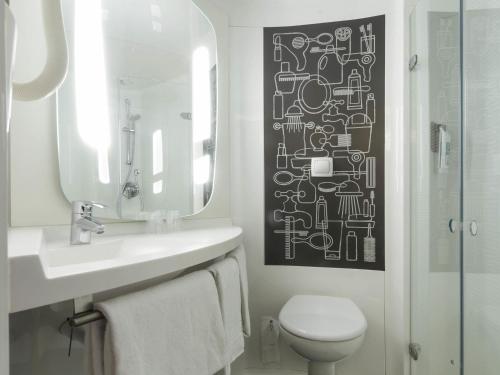 Habitación Doble Estándar 2 camas - adaptada para personas con movilidad reducida del hotel Ibis London Stratford. Foto 4