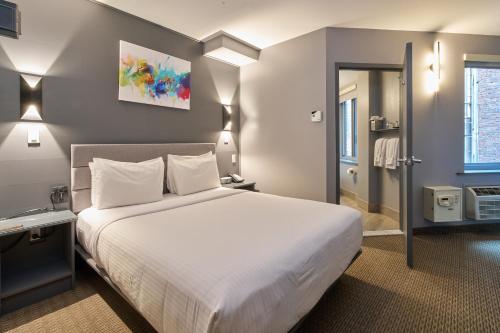 Habitación Cozy con cama grande del hotel The Lex Nyc