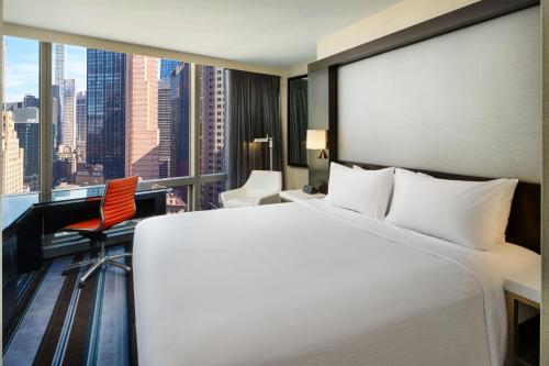 Habitación con vistas a la ciudad - Cama extragrande del hotel Courtyard by Marriott New York Manhattan / Central Park
