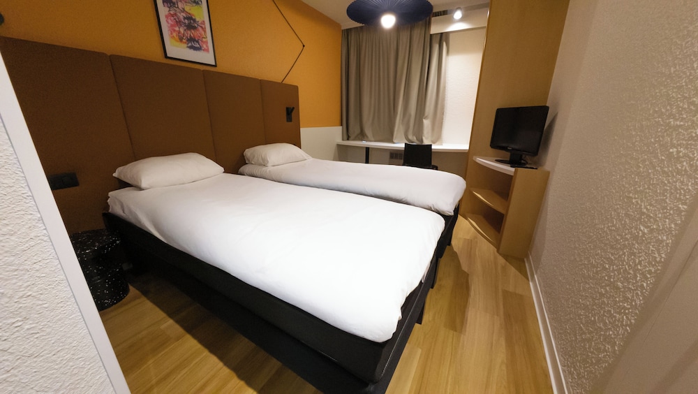 Habitación estándar, 2 camas individuales del hotel Ibis Lyon Est Bron. Foto 4