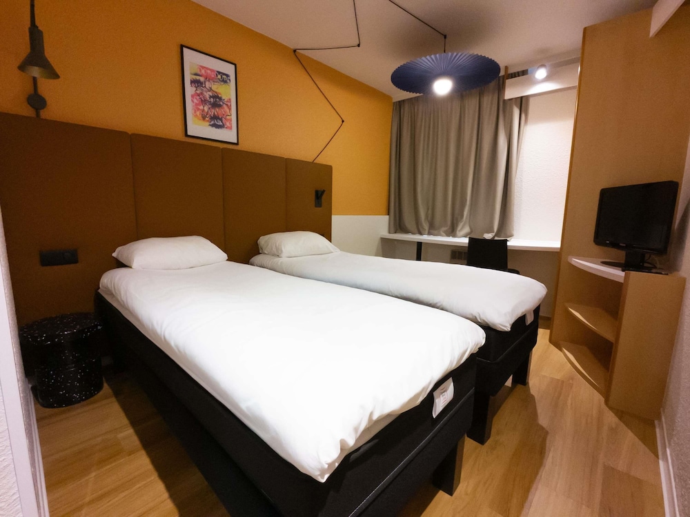 Habitación estándar, 2 camas individuales del hotel Ibis Lyon Est Bron. Foto 5