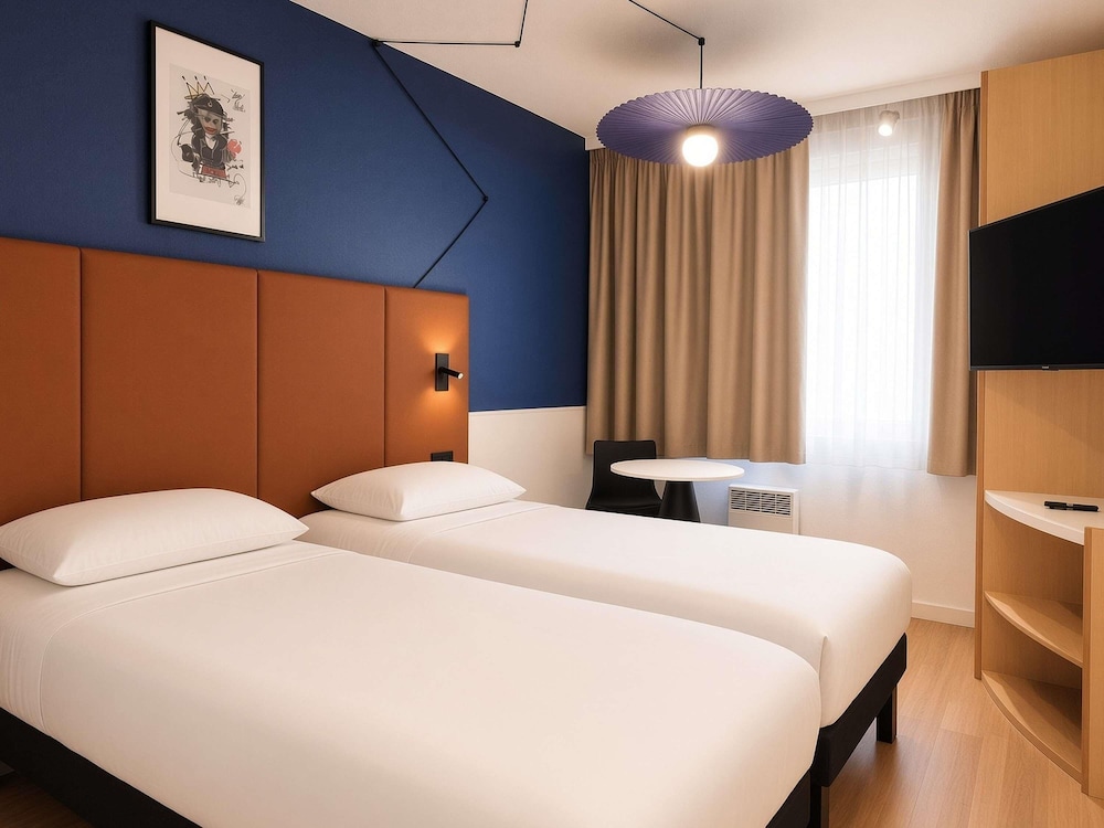 Habitación estándar, 2 camas individuales del hotel Ibis Lyon Est Bron. Foto 6