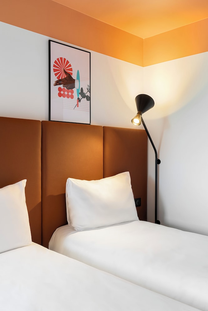 Habitación Standard con 2 camas individuales del hotel Ibis Nice Aéroport Promenade Des Anglais. Foto 1