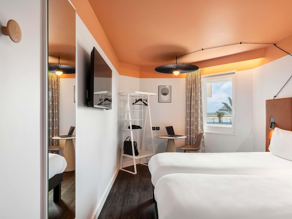 Habitación Standard con 2 camas individuales del hotel Ibis Nice Aéroport Promenade Des Anglais. Foto 5
