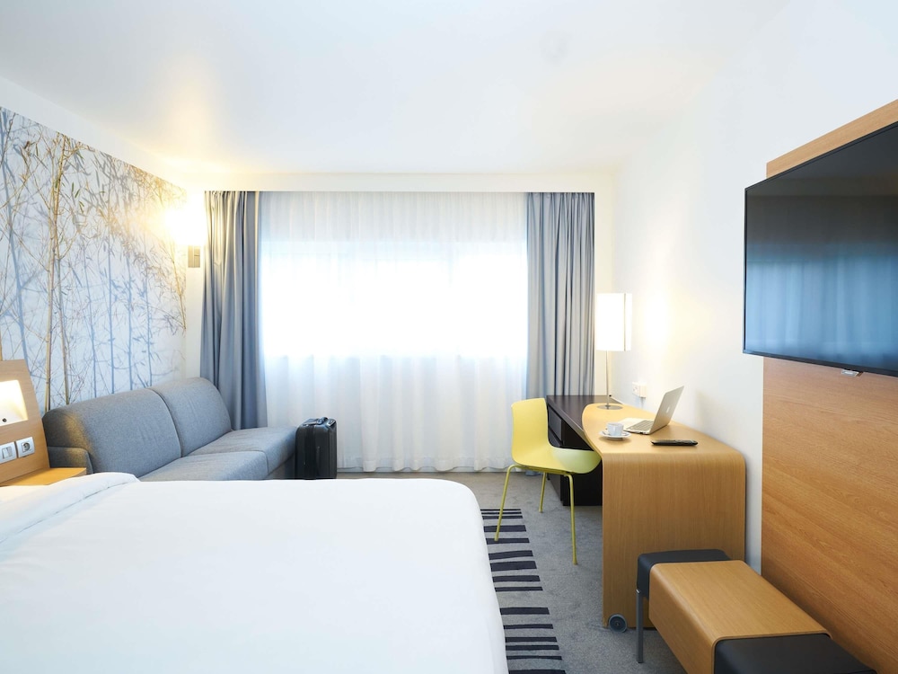 Habitación Clásica - 1 cama doble y 1 sofá - cama para 1 persona del hotel Novotel Marne La Vallée Collégien. Foto 3