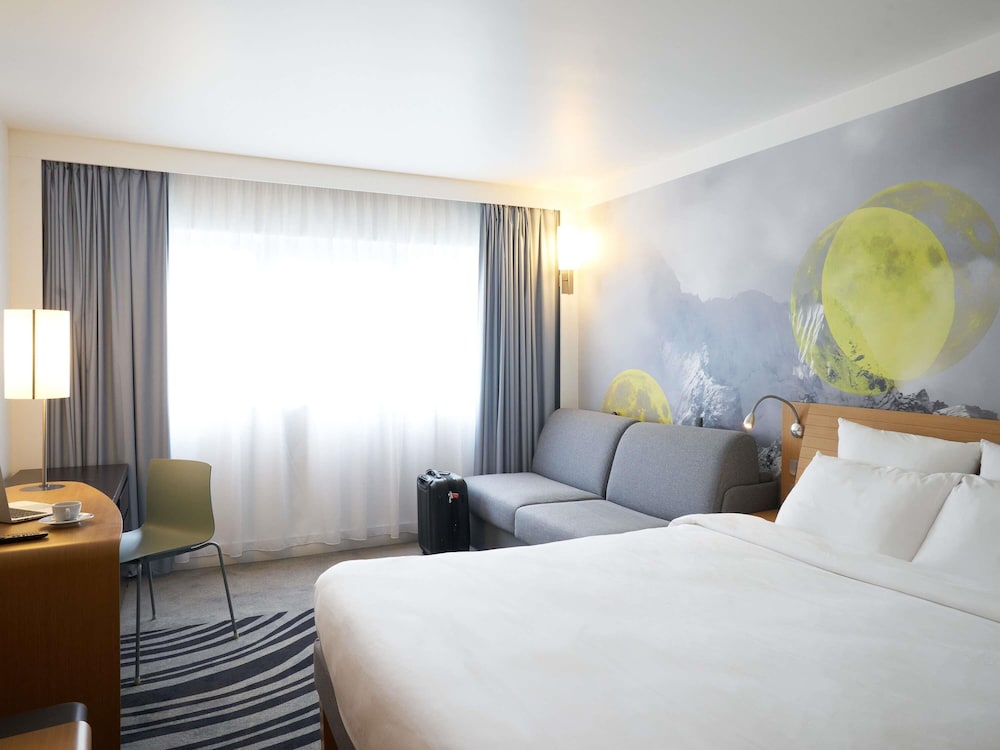Habitación Clásica - 1 cama doble y 1 sofá - cama para 1 persona del hotel Novotel Marne La Vallée Collégien. Foto 5