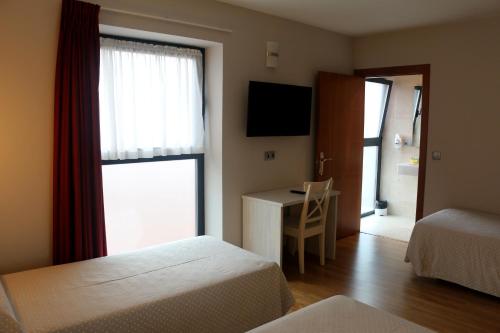Habitación Triple del hotel 44. Foto 4