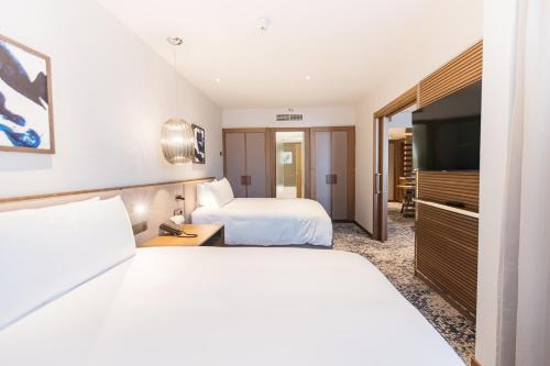 Suite Doble de 1 dormitorio con sofá cama y balcón - 2 camas del hotel Intercontinental Barcelona, An Ihg. Foto 3