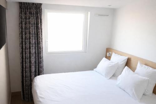 Dos Habitaciones Comfort Contiguas del hotel Geographotel Paris - Roissy Cdg Airport