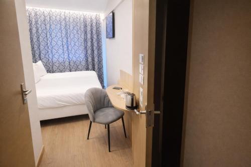 Dos Habitaciones Comfort Contiguas del hotel Geographotel Paris - Roissy Cdg Airport. Foto 5