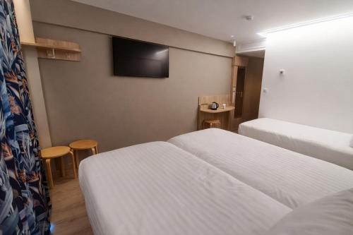 Habitación Triple Confort del hotel Geographotel Paris - Roissy Cdg Airport