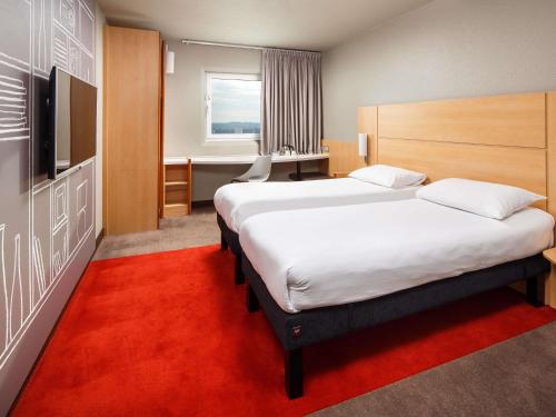 Habitación Doble - 2 camas del hotel Ibis London Wembley. Foto 1