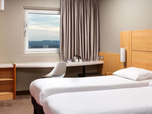 Habitación Doble - 2 camas del hotel Ibis London Wembley. Foto 3