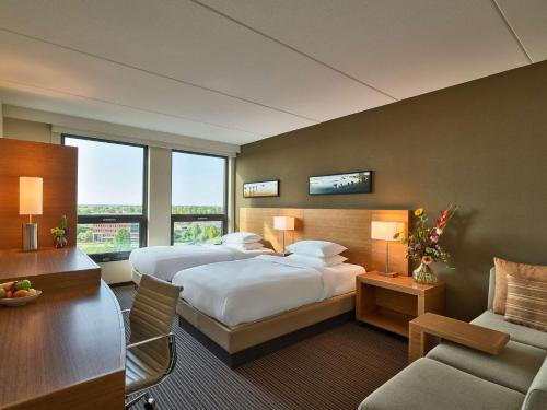 Habitación Doble en la planta alta - 2 camas del hotel Hyatt Place Amsterdam Airport. Foto 1