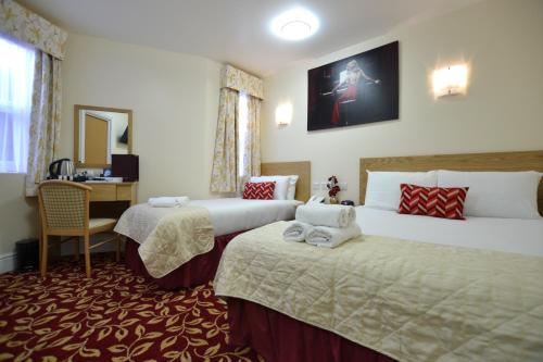 Habitación familiar - cama doble e individuales del hotel Best Western Greater London