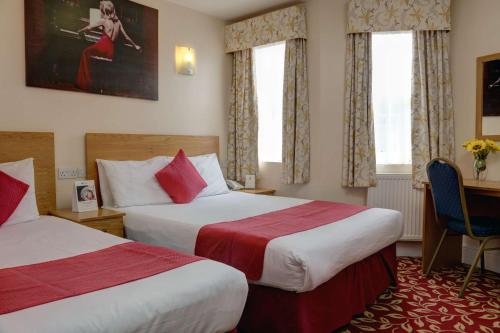 Habitación Familiar con 2 camas dobles del hotel Best Western Greater London. Foto 4