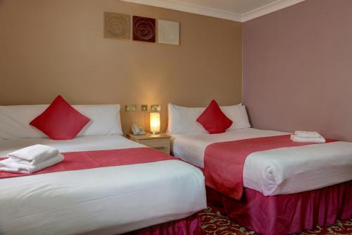Habitación Familiar con 2 camas dobles del hotel Best Western Greater London. Foto 7