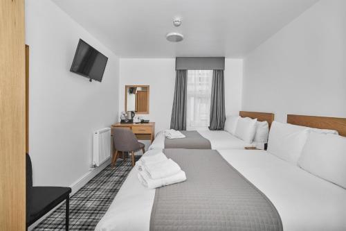 Habitación Familiar con 2 camas dobles del hotel Best Western Greater London. Foto 8
