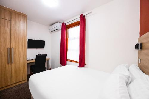 Habitación Doble Estándar del hotel Oyo Arinza , London Ilford. Foto 3