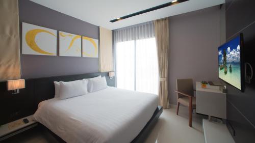 Suite Junior del hotel The Charm Resort Phuket. Foto 2